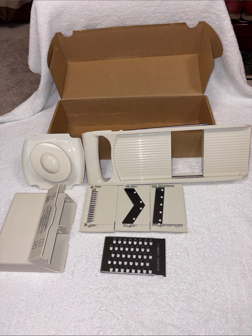 The Pampered Chef ultimate Plastic Mandoline Slicer with Multiple Blade Inserts